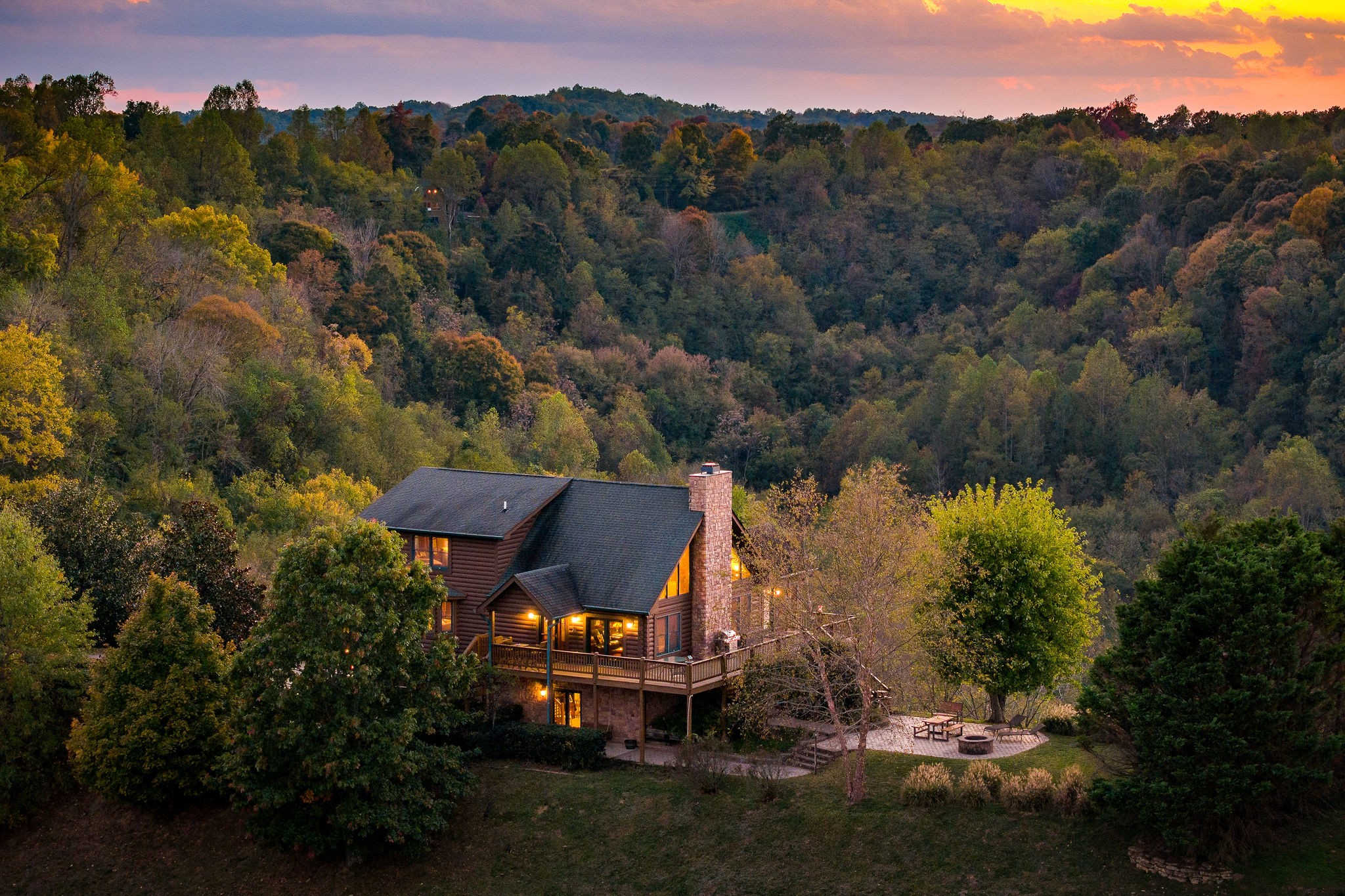 an aerial view of a house with mountain view