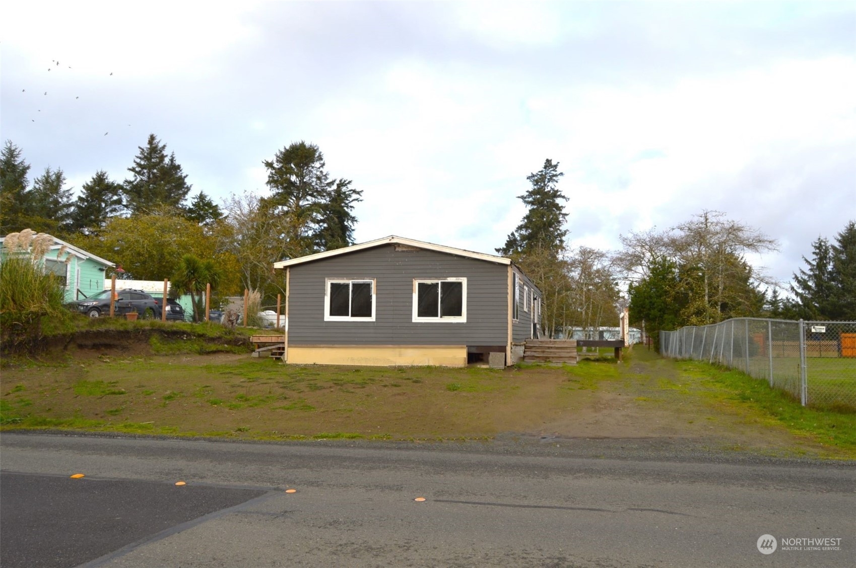 a house with a yard in front of it