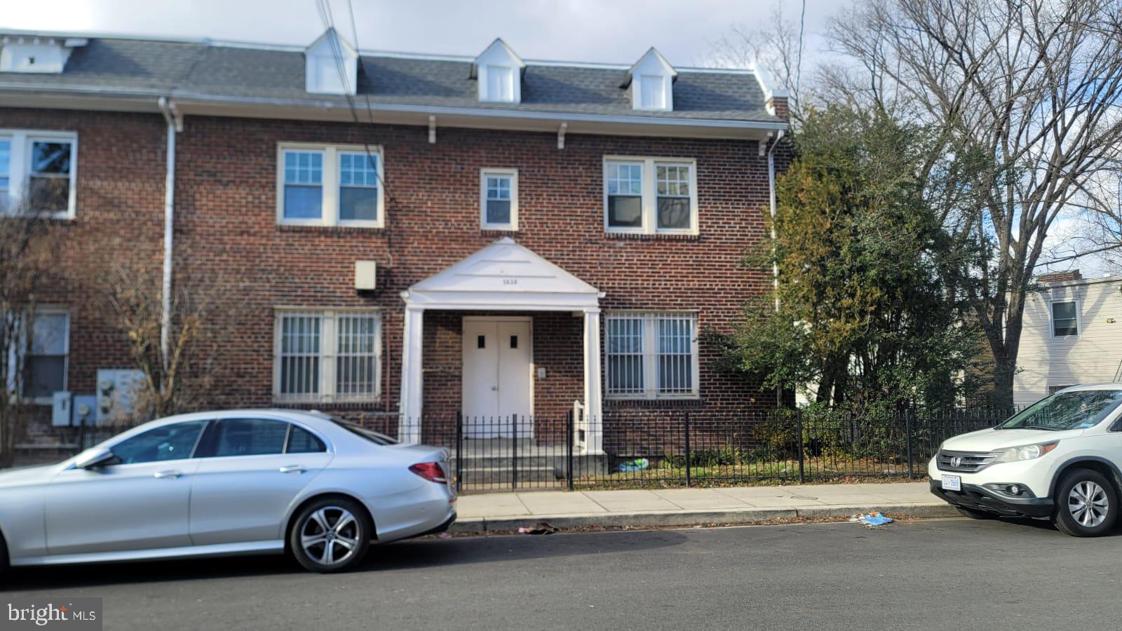 Front with fenced  yard