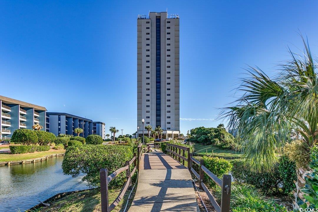 Exterior space with a water view