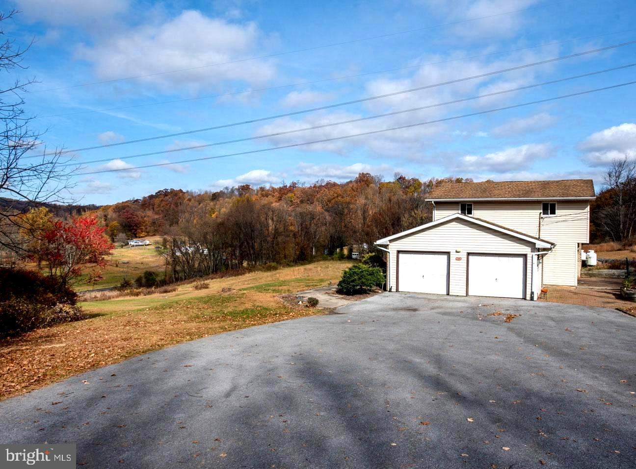 a view of a house with a big yard