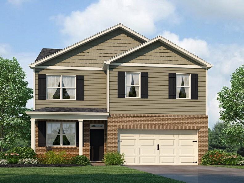 a front view of a house with garage and garage