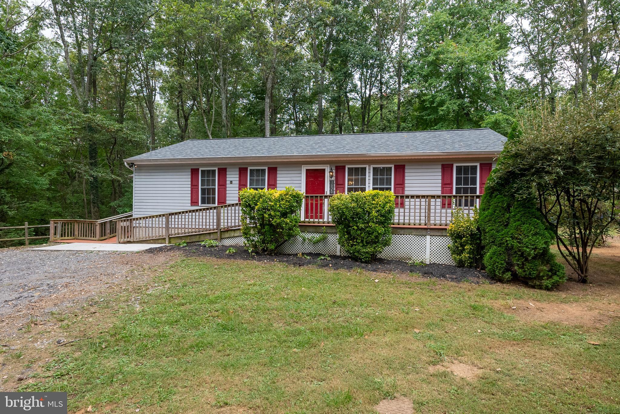 a house with trees in front of it