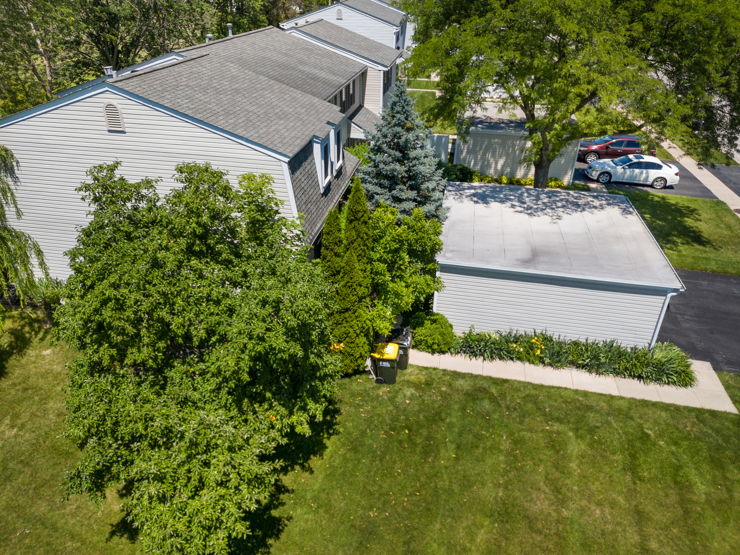 a aerial view of a house with a yard