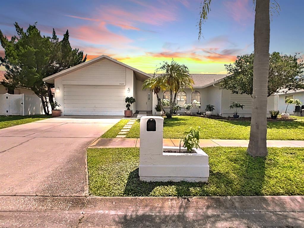 a view of a house with swimming pool