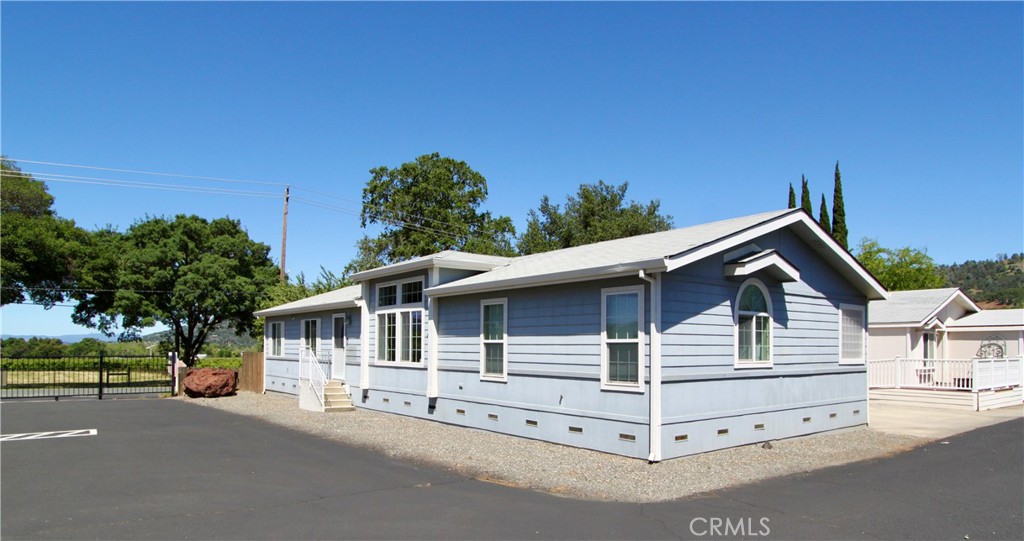 a front view of a house with a garage