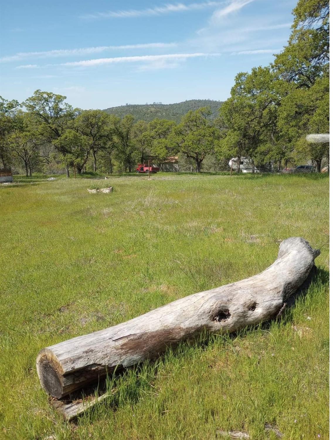 a view of a lake with a yard