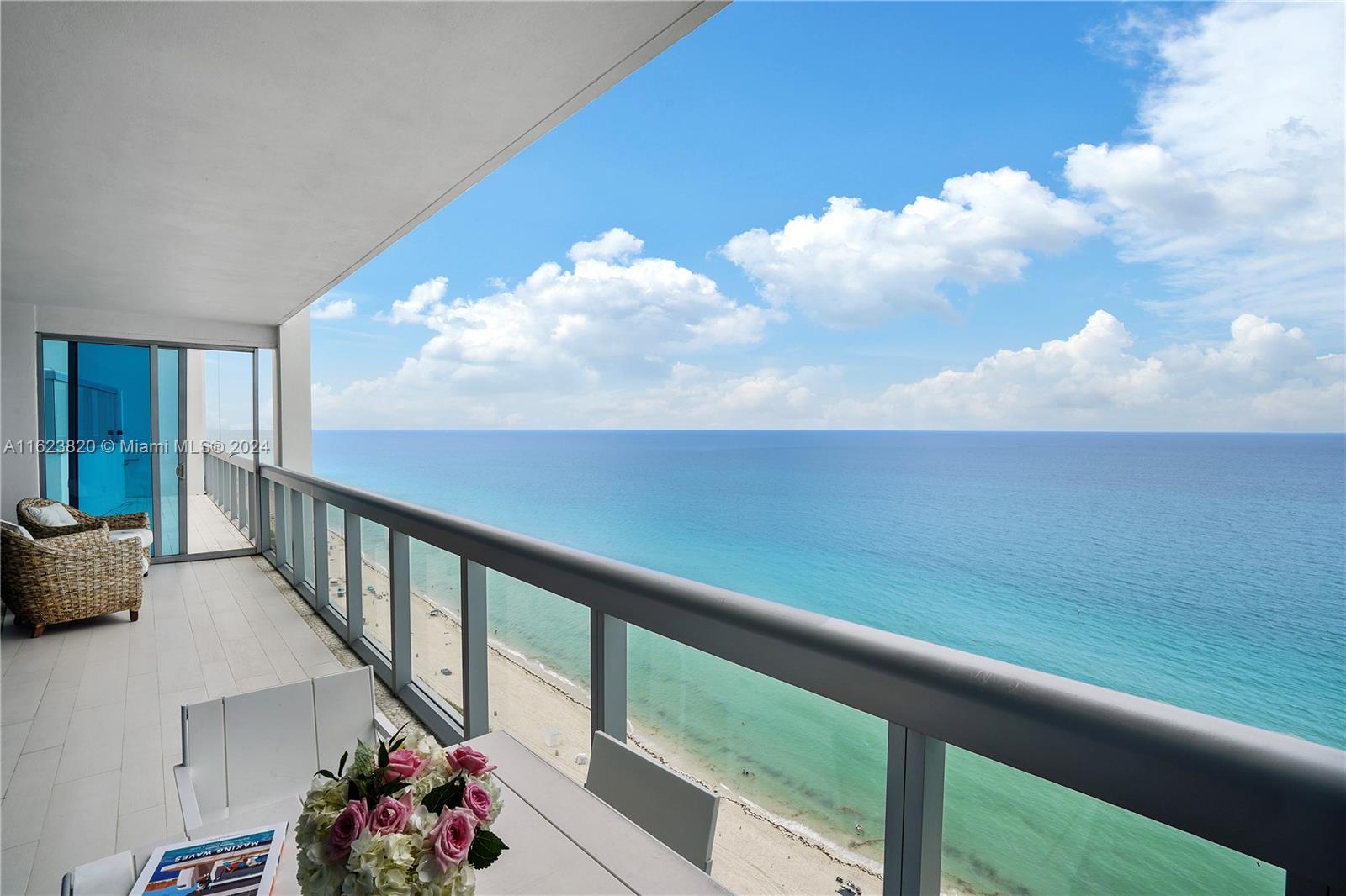 a view of balcony with furniture