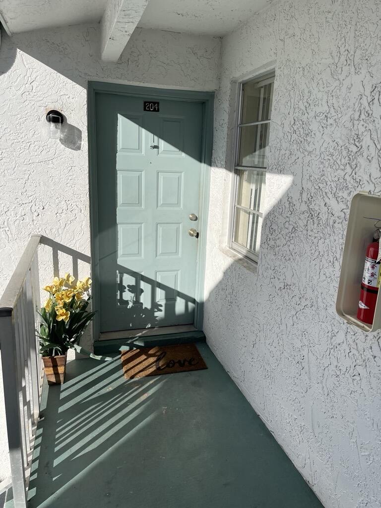 a front view of a house with entryway