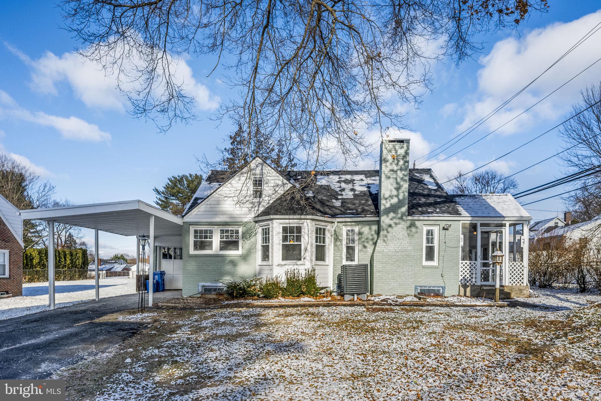 a front view of a house with a porch