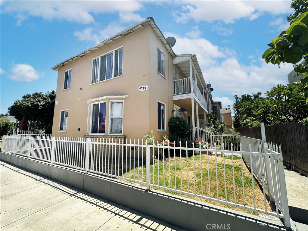 a view of a house with a balcony