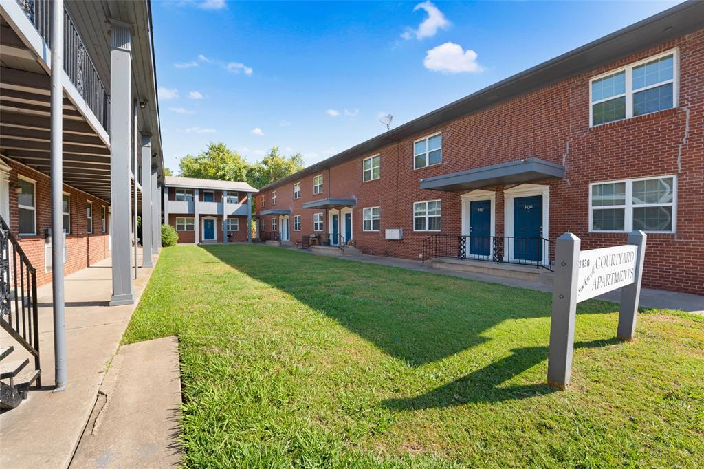 a house view with a garden space