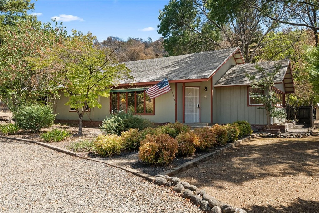 front view of a house with a small yard