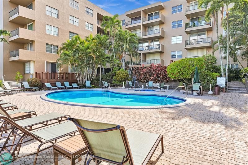 a view of a backyard with a patio