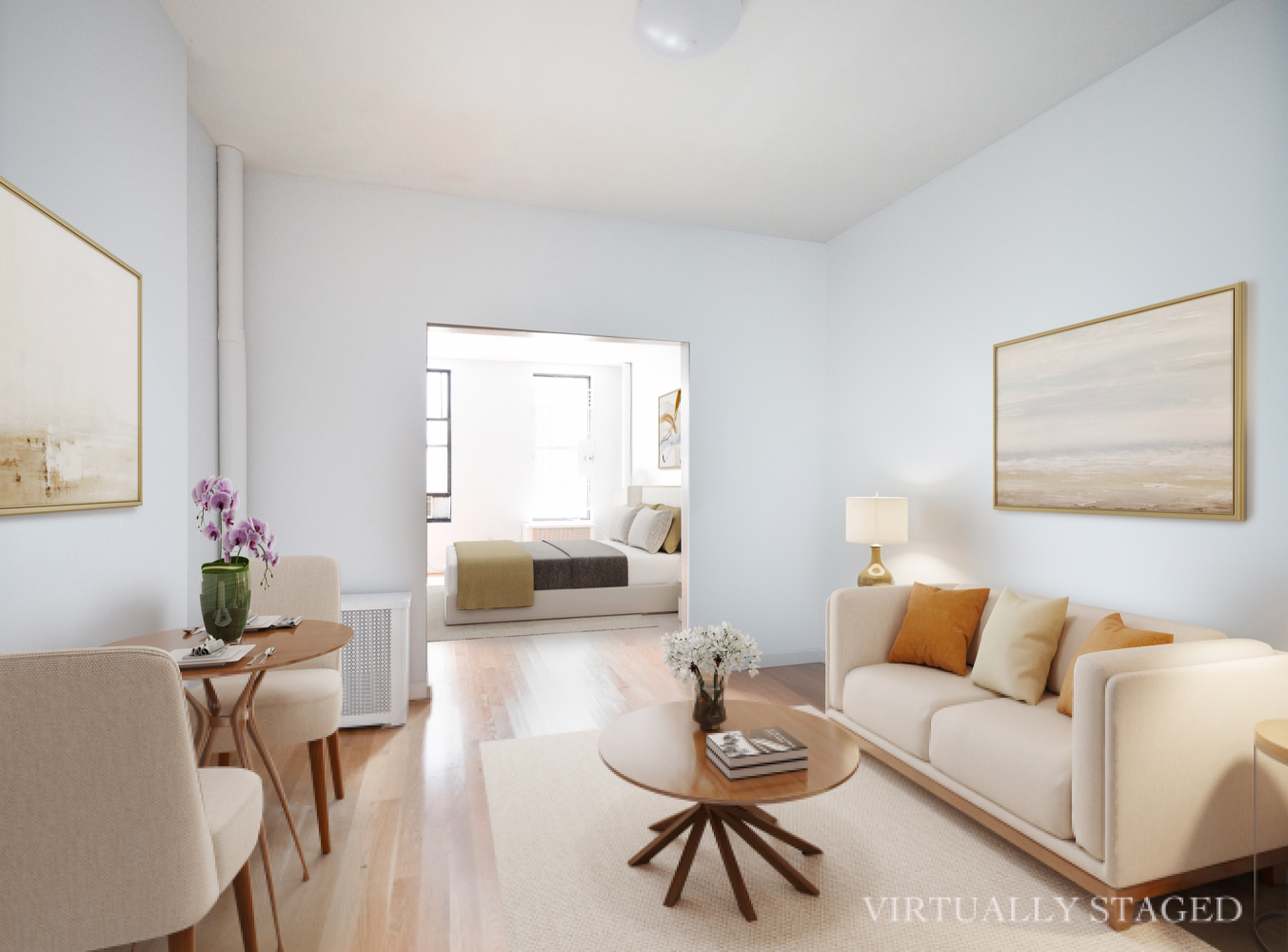 a living room with furniture and wooden floor