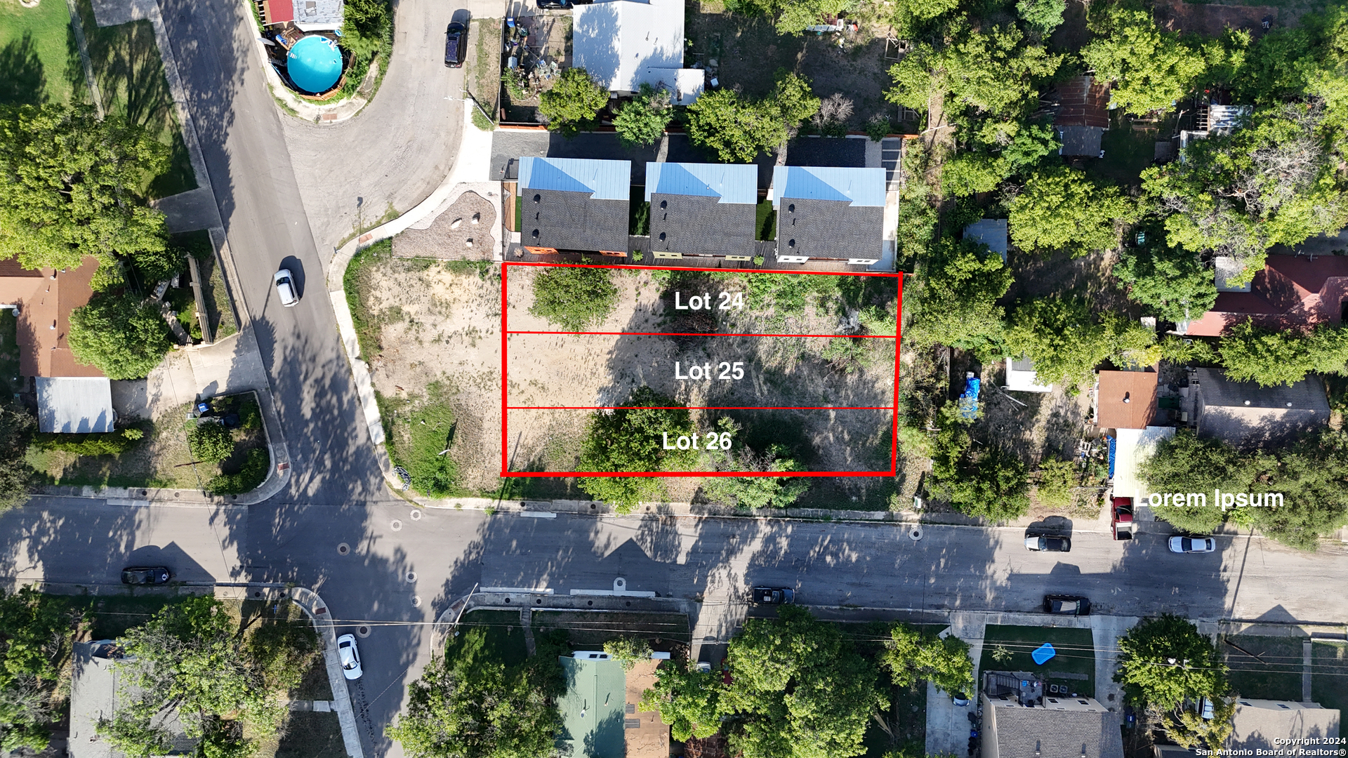 an aerial view of a house with a garden and plants