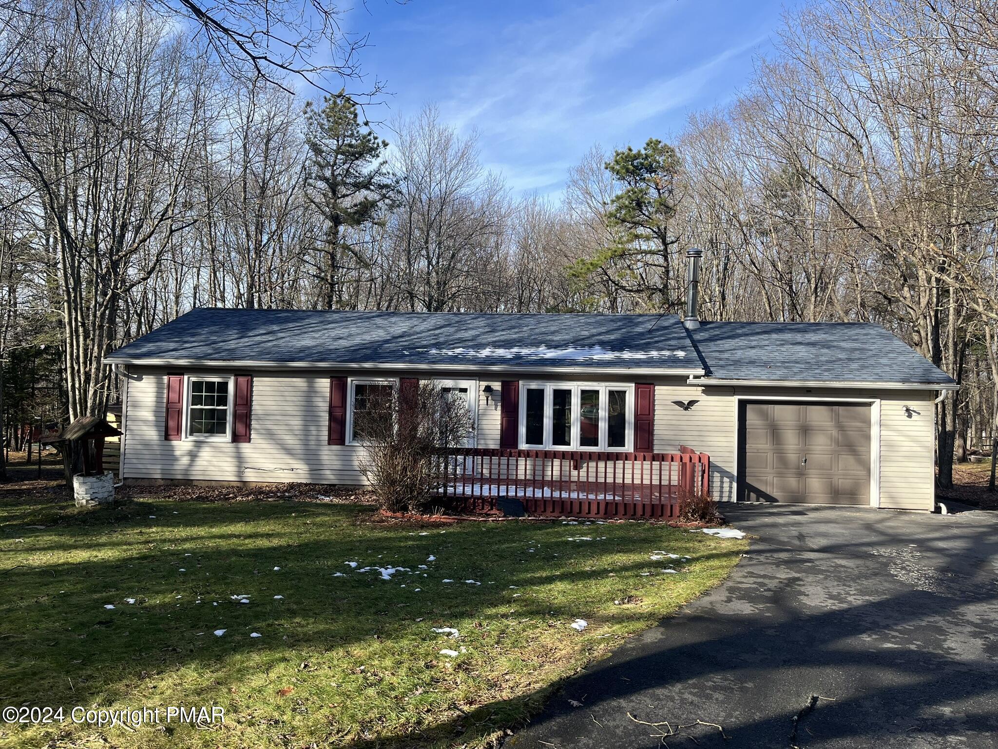 a front view of house with yard and porch