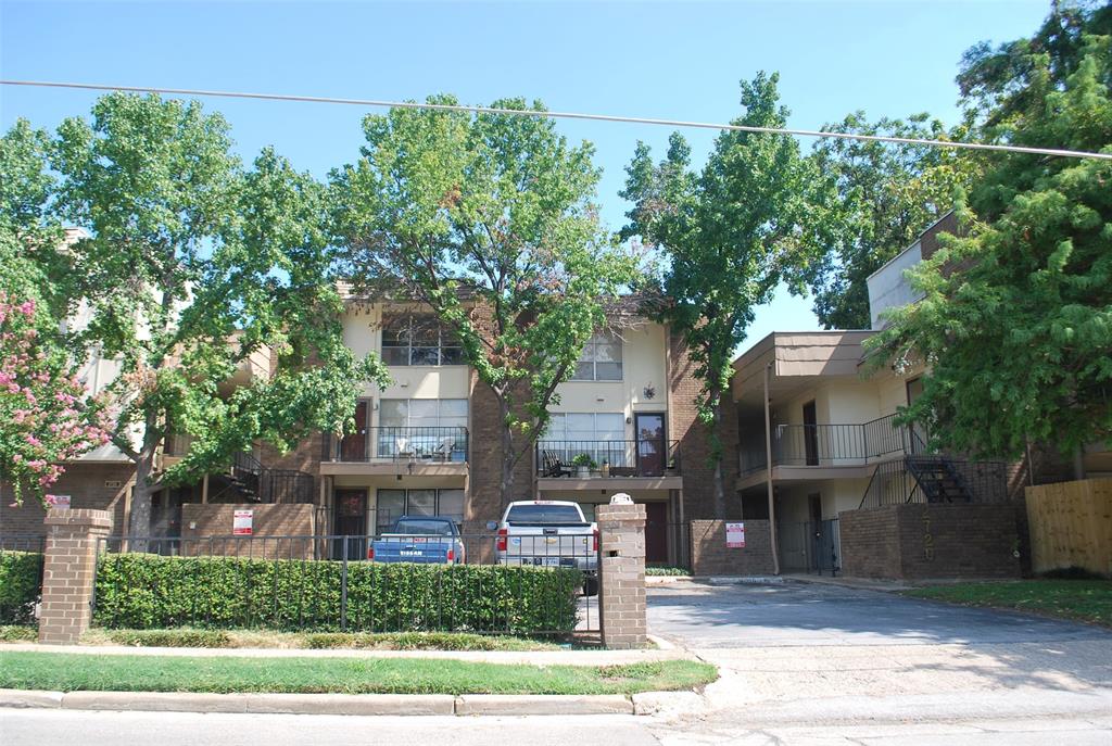 an front view of a house with a yard