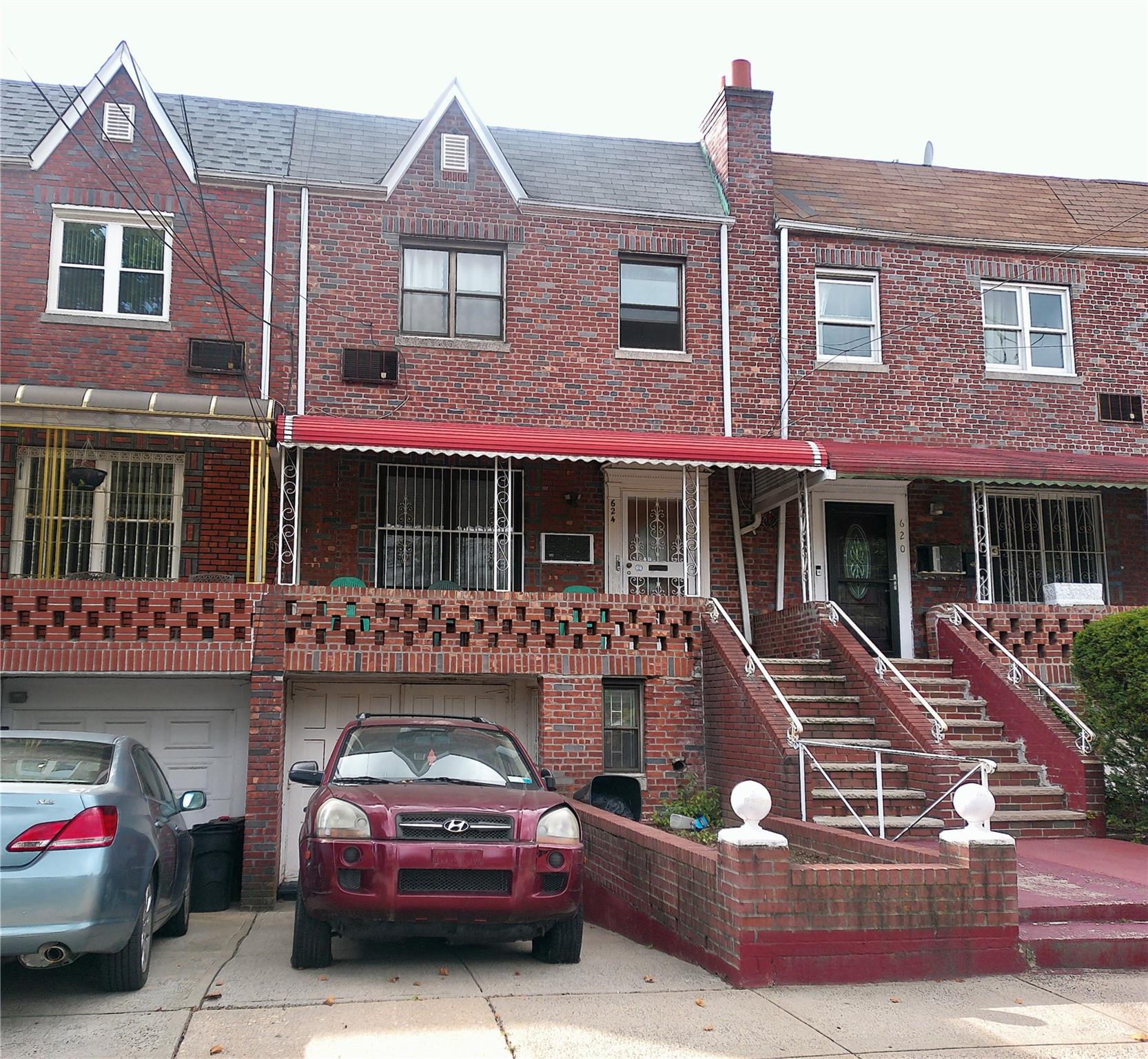 View of property featuring a garage