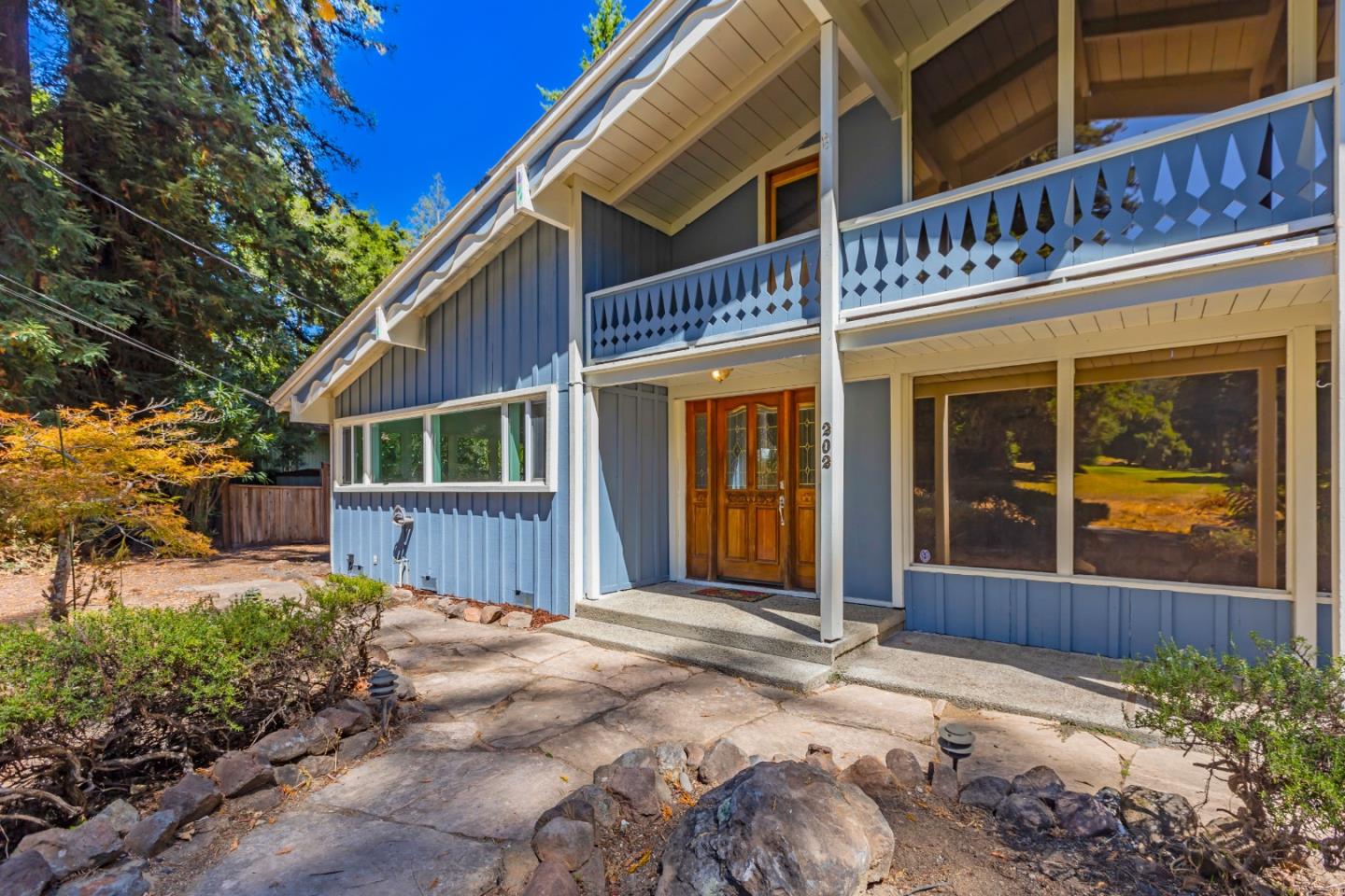 a front view of a house with a porch