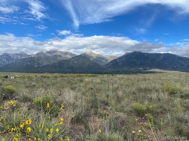 a view of an outdoor space and mountains