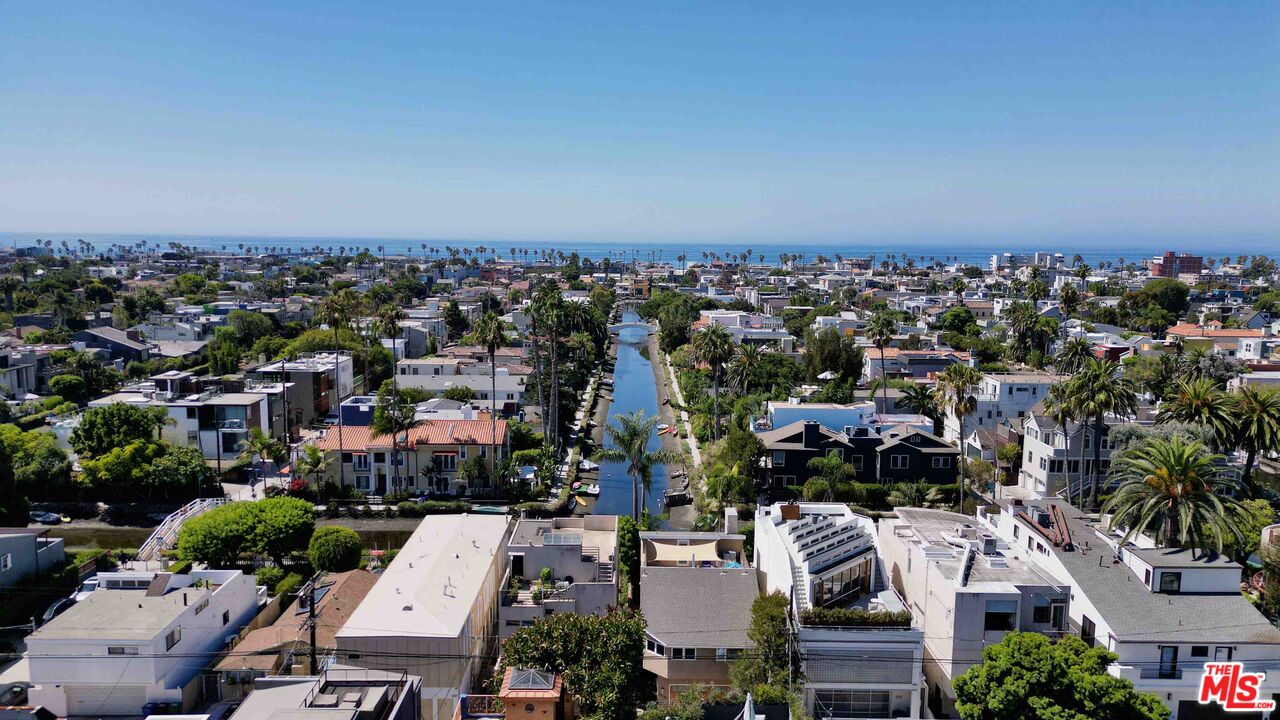 an aerial view of a city with lots of residential buildings