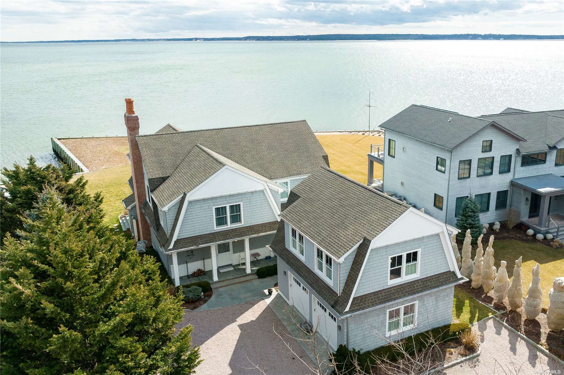 a aerial view of a house with a yard