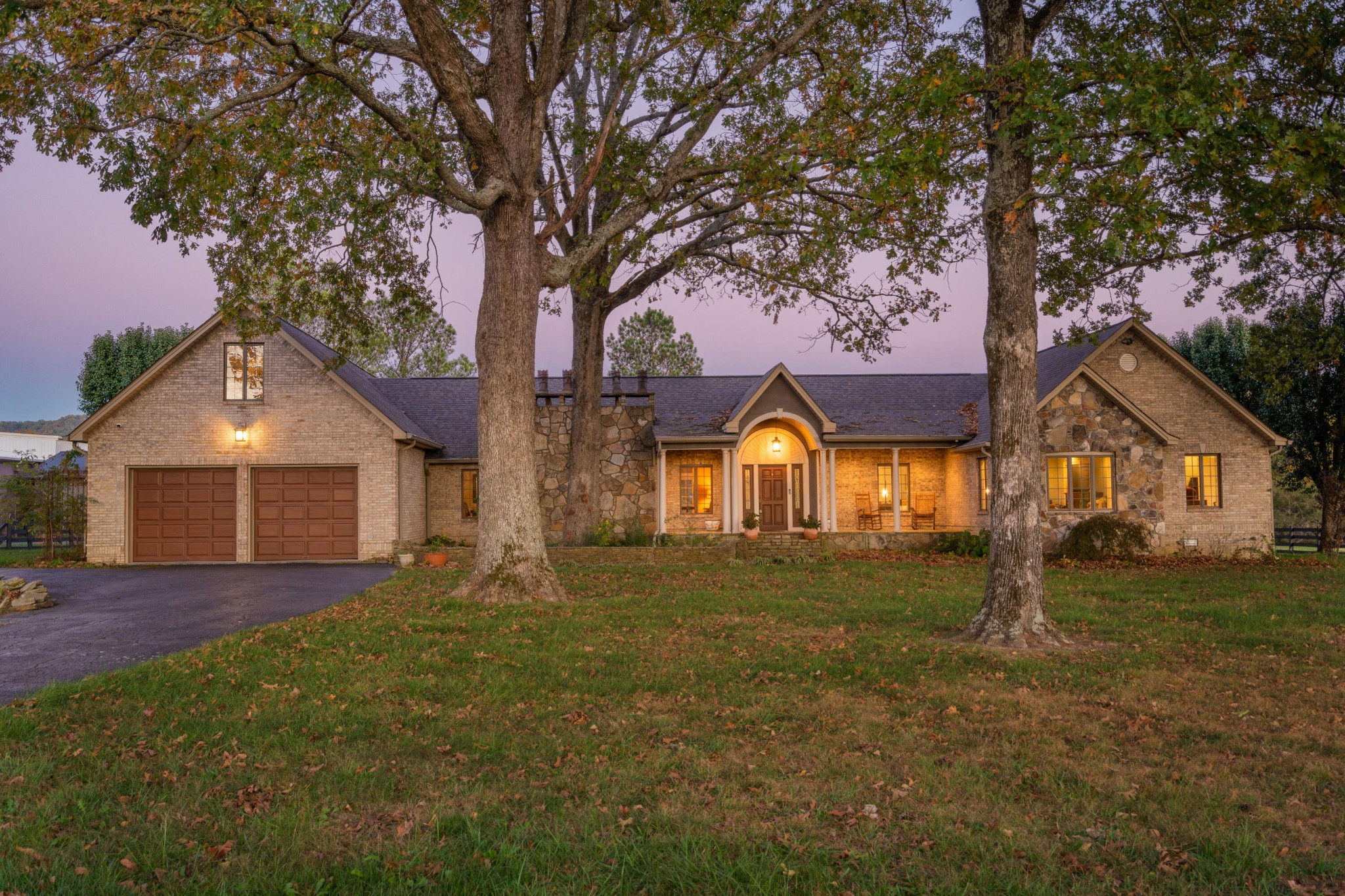 front view of a house with a yard