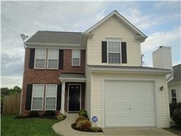 a front view of a house with entertaining space