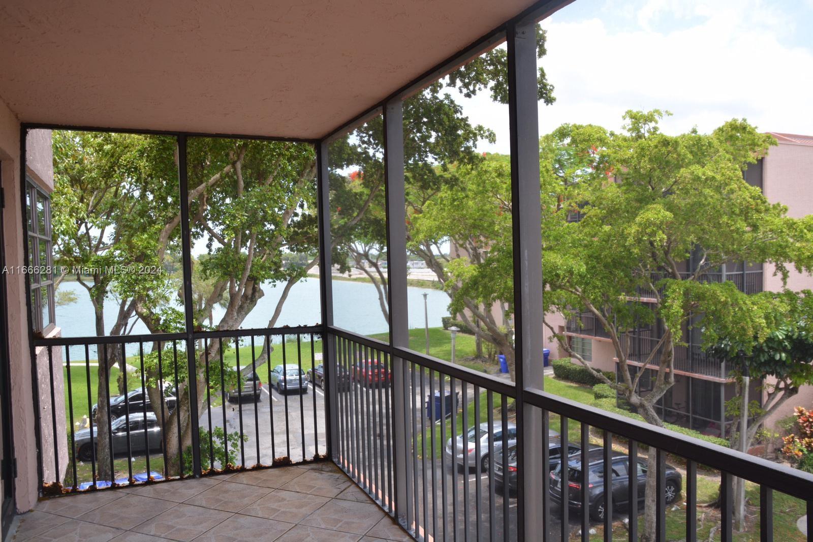 a view of a street from a balcony