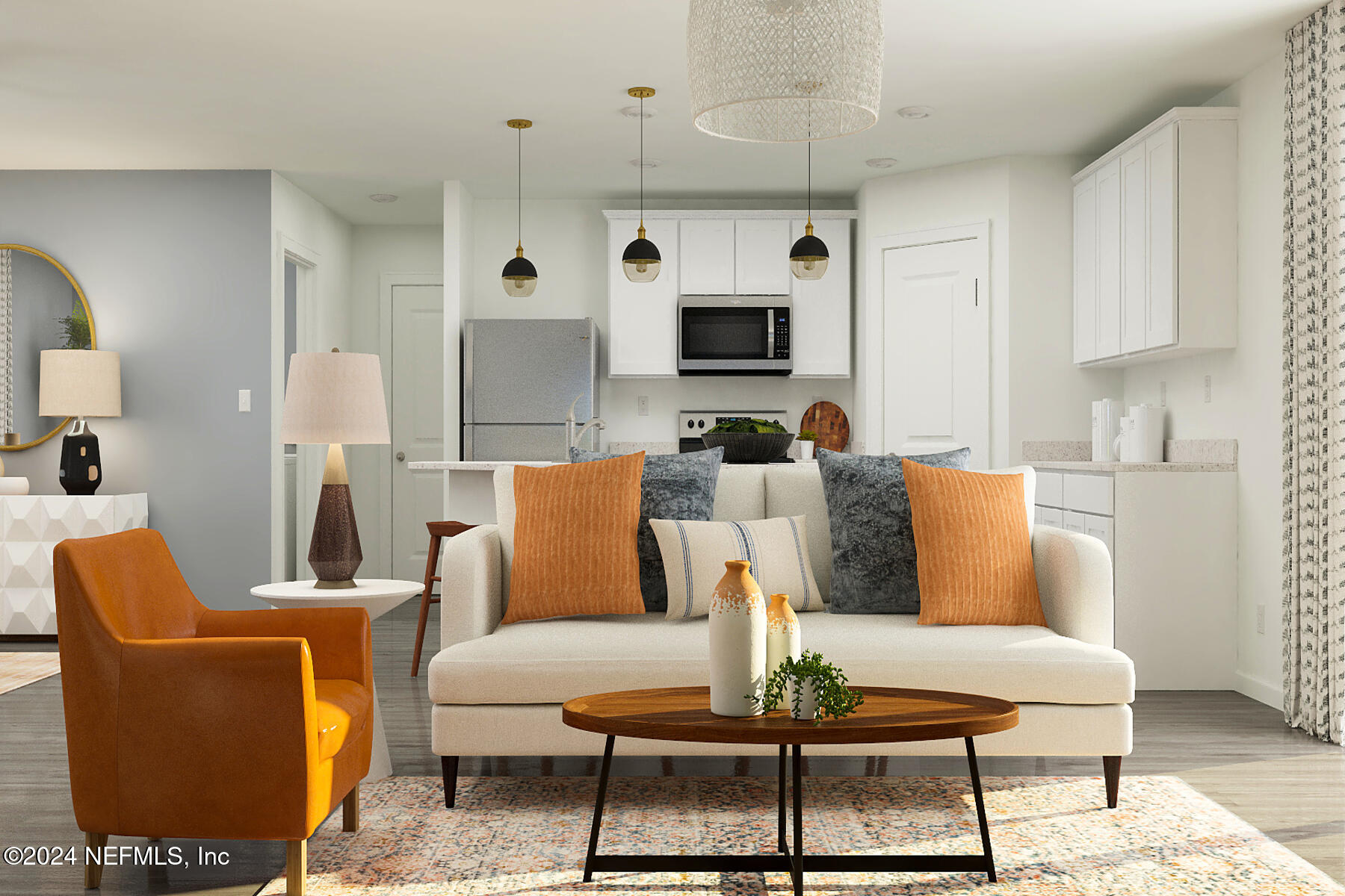 a living room with furniture a flat screen tv and kitchen view