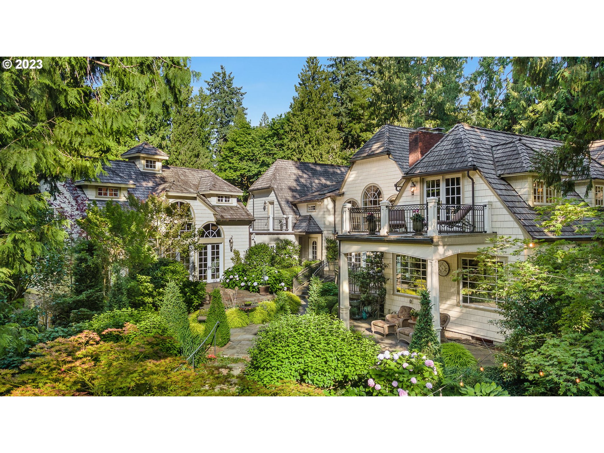 a upper view of a house with a garden