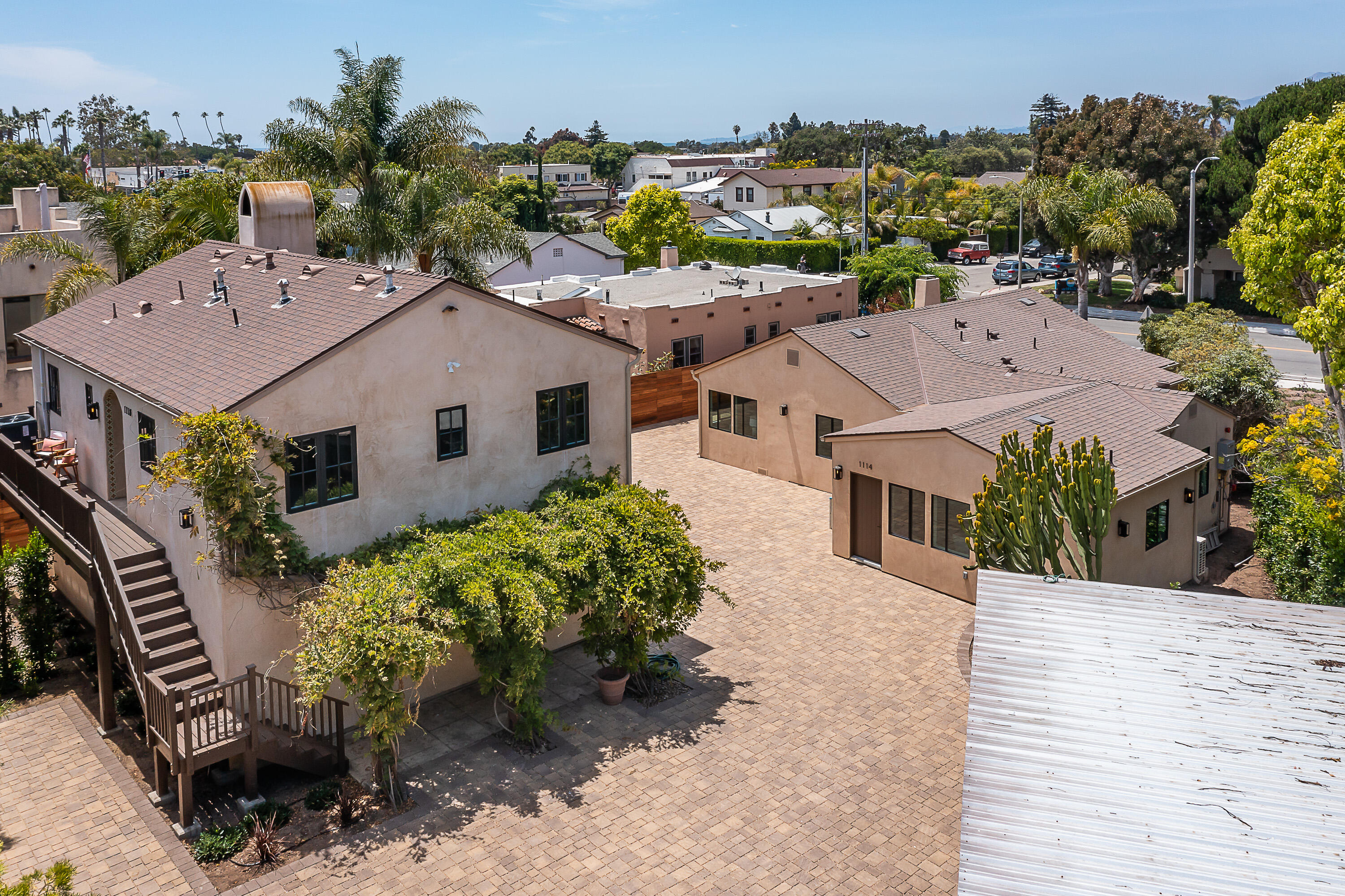 a aerial view of a house with a yard and a garden