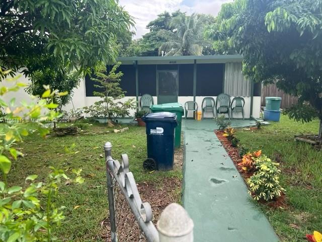 a view of a backyard with garden