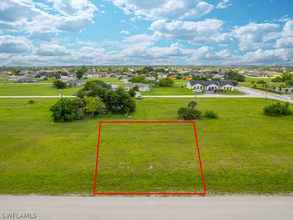 a view of a lake with a big yard