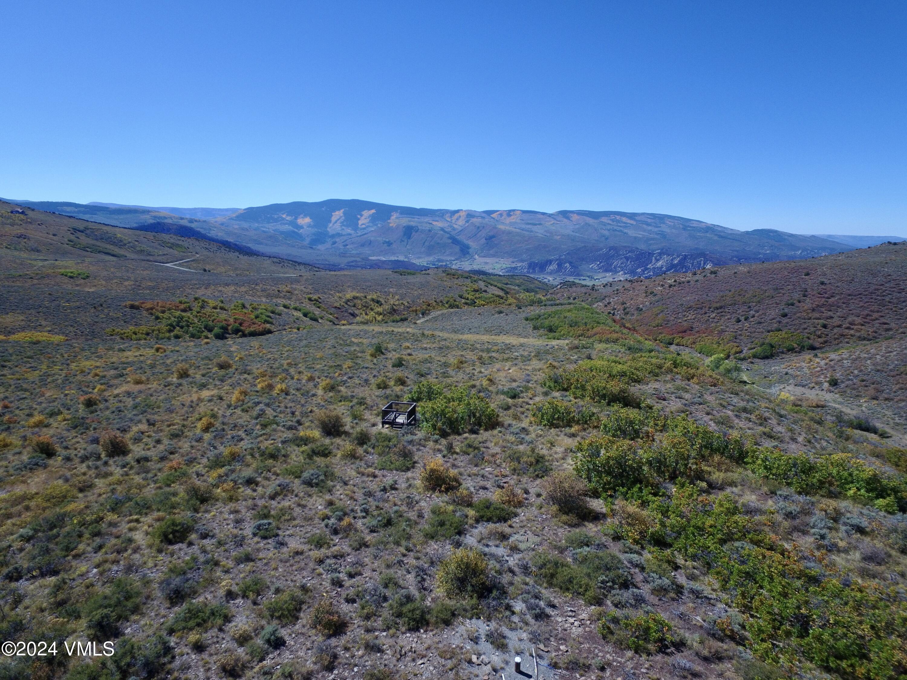 a view of mountain and a mountain