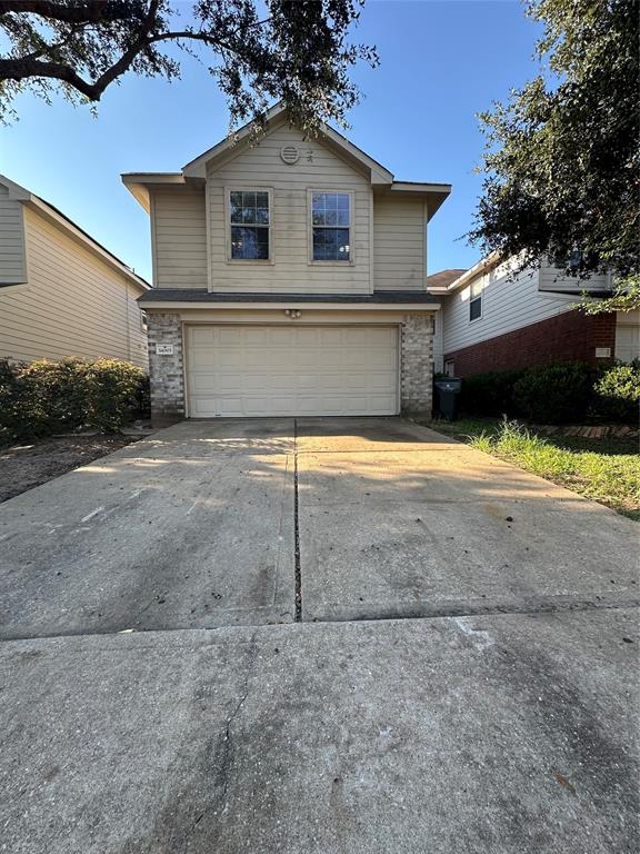 a view of garage and yard