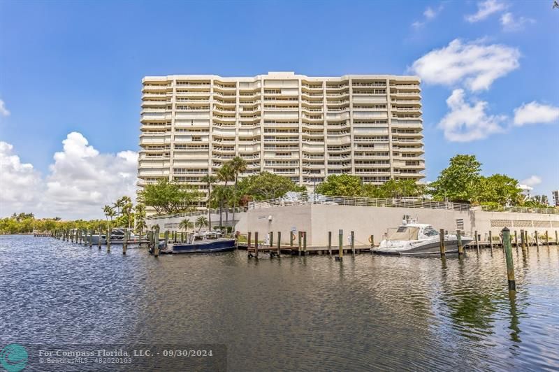 a front view of a building with lake view