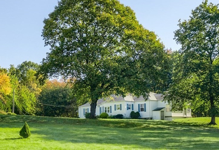 a house view with garden space