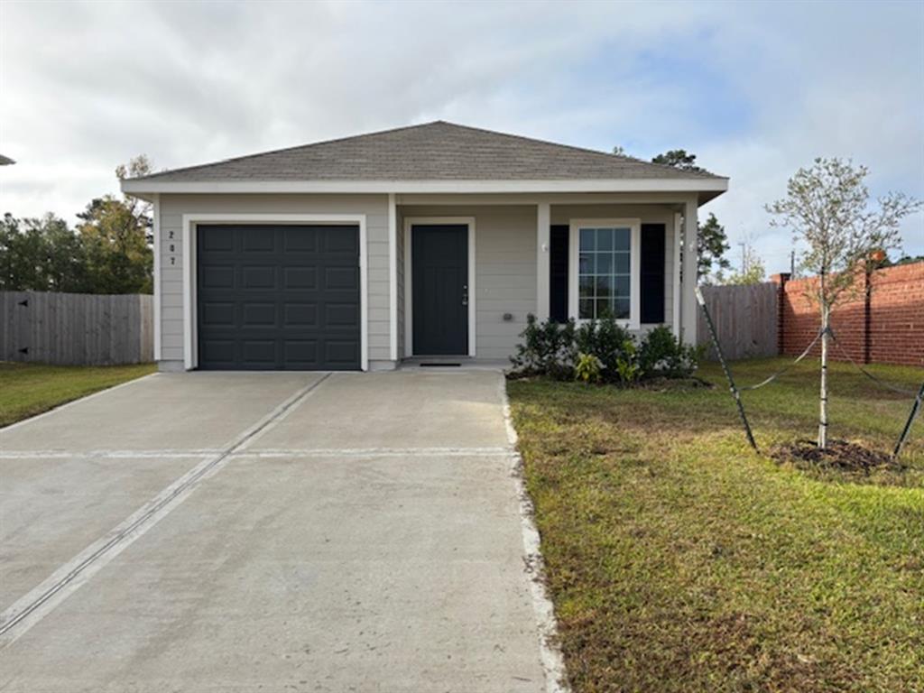 front view of a house with a yard