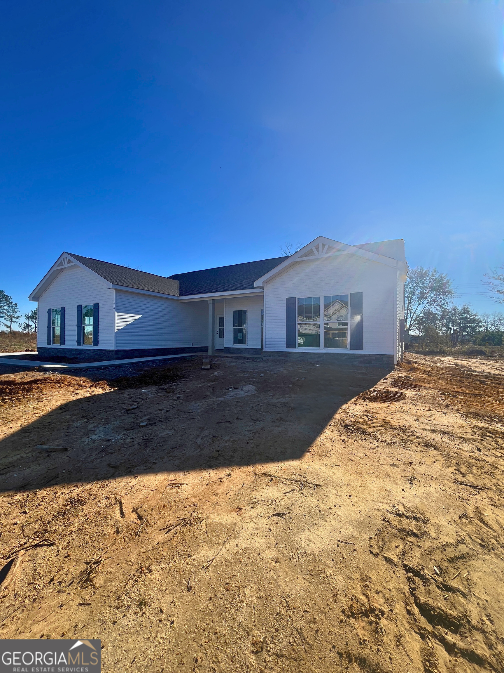 a view of house with outdoor space