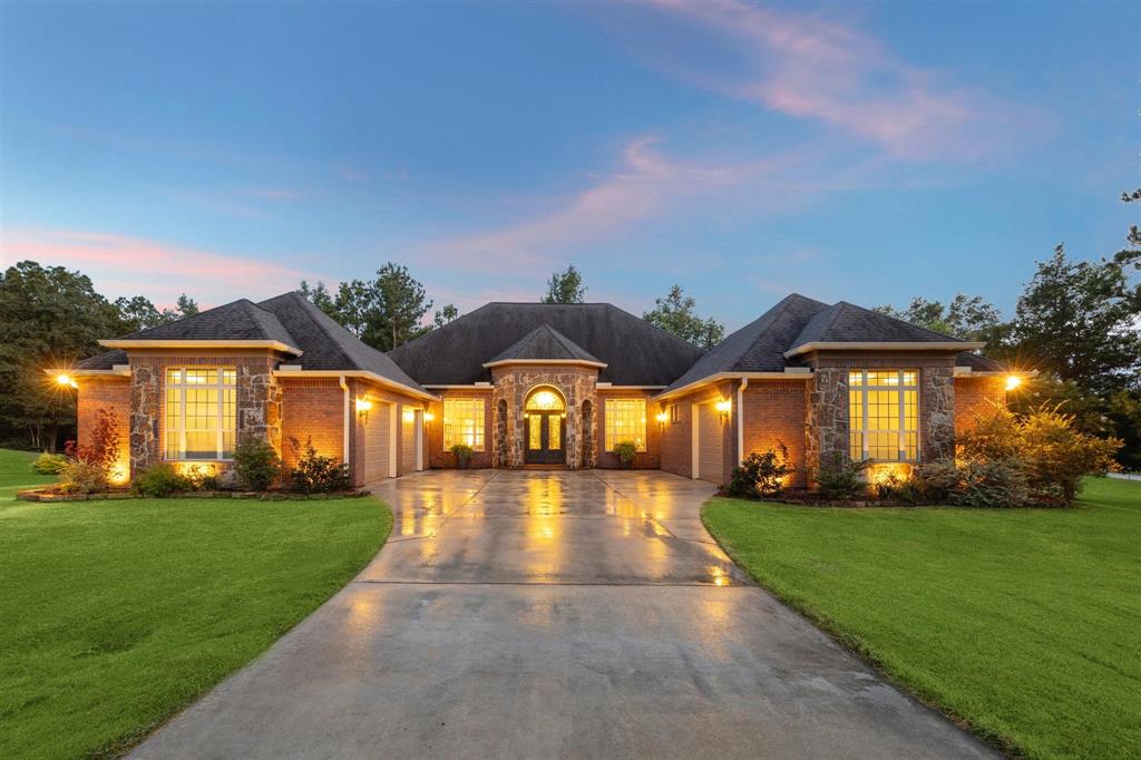 Welcome home to this stately brick and stone residence