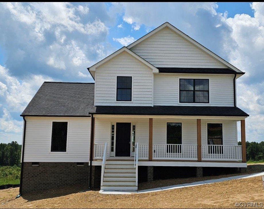 a front view of a house with garage