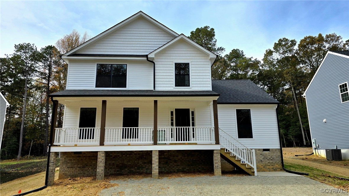 a front view of a house with a porch