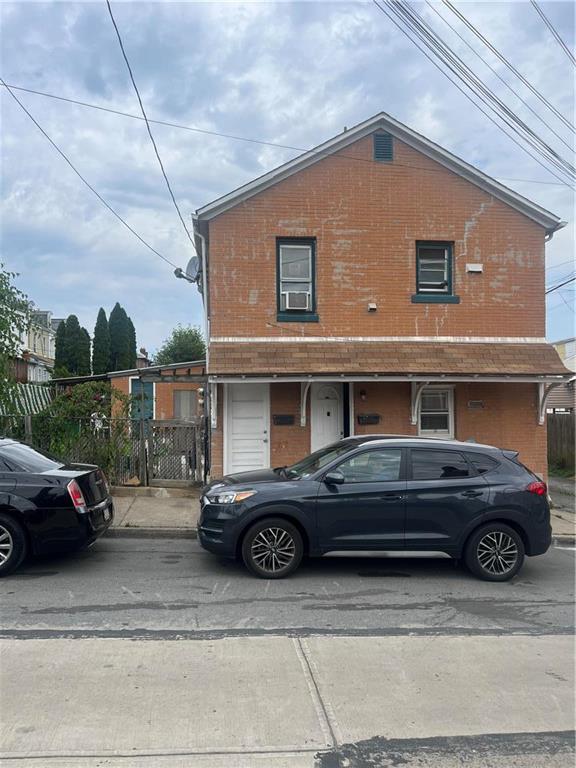 a car parked in front of a building