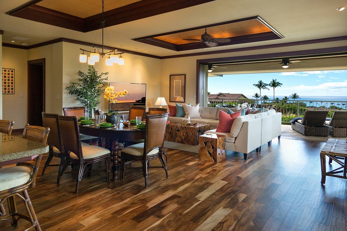 a view of a dining room with furniture window and outside view