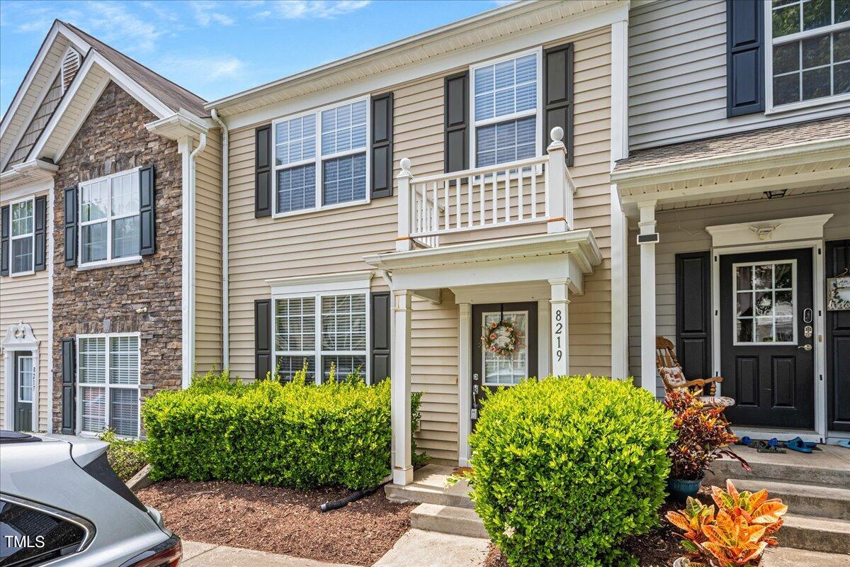 a house with a flower garden