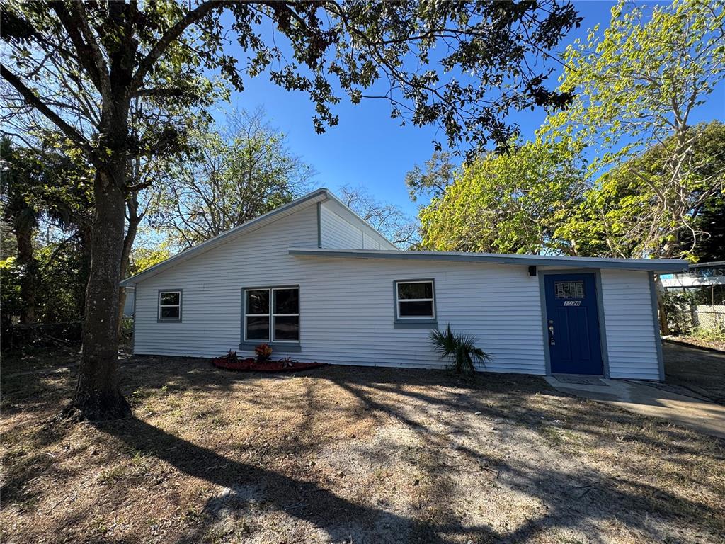 front view of house with a yard