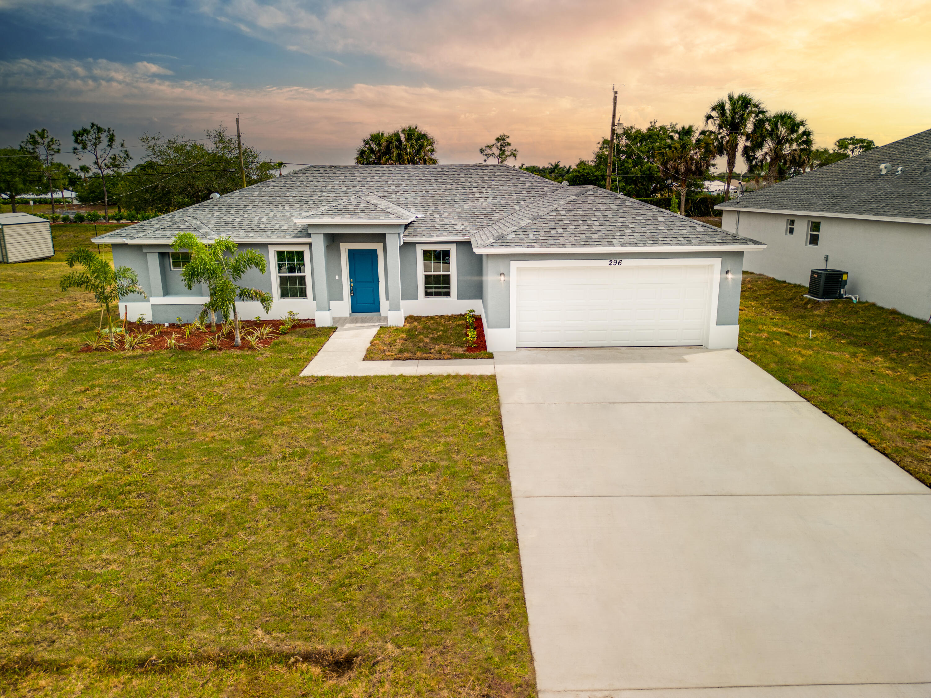 a aerial view of a house with swimming pool