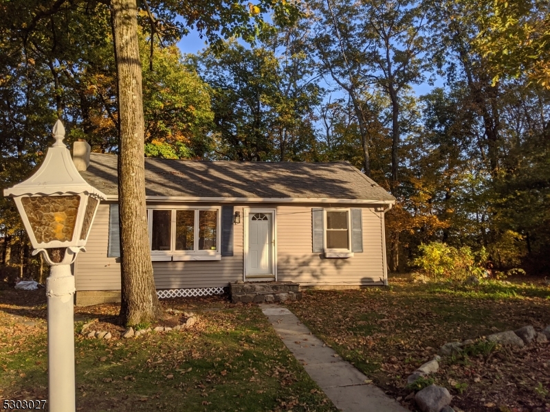 a front view of house with yard